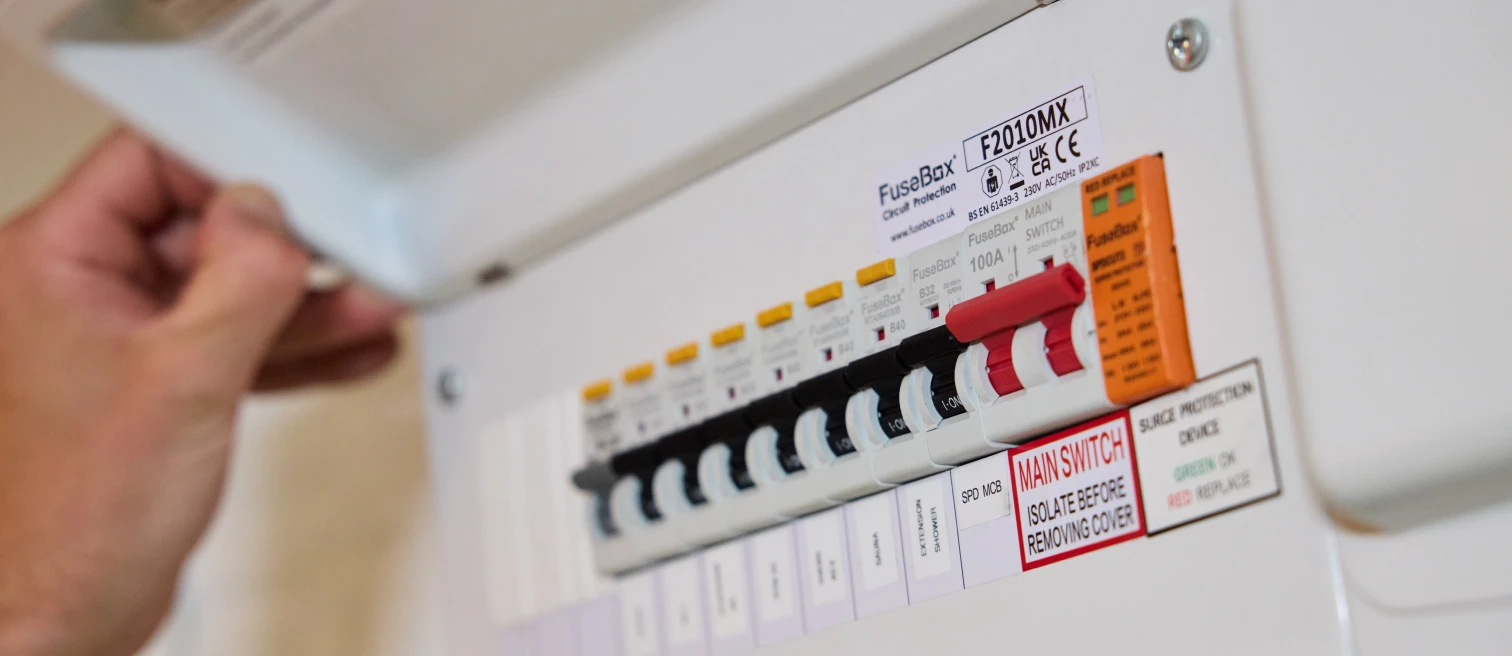 Modern FuseBox consumer unit with RCBOs, surge protection and a red main switch