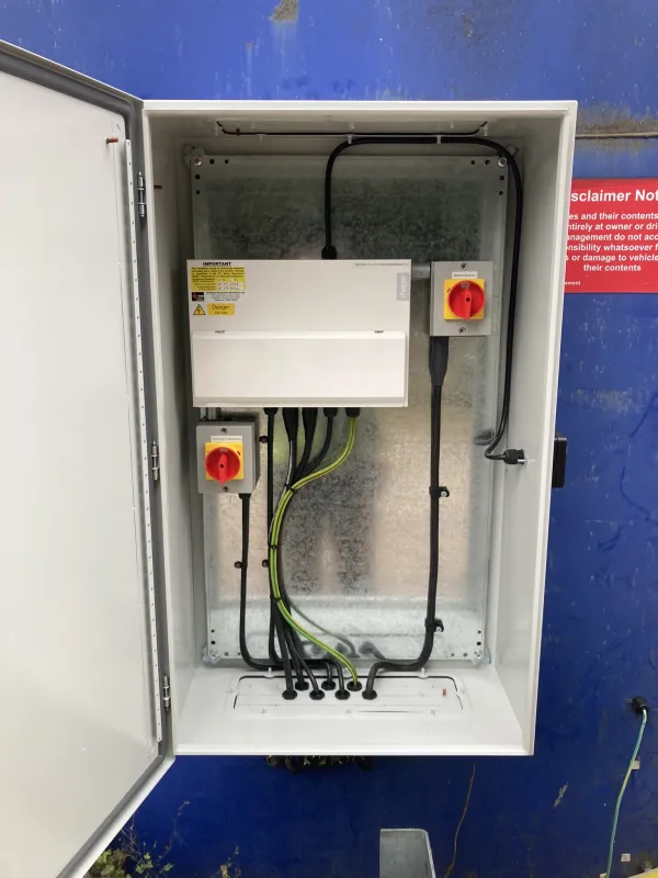 External consumer unit and isolators mounted in a weatherproof enclosure