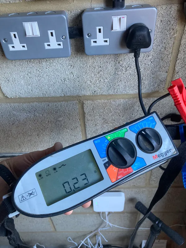 Garage double sockets being tested with a Megger multifunction tester