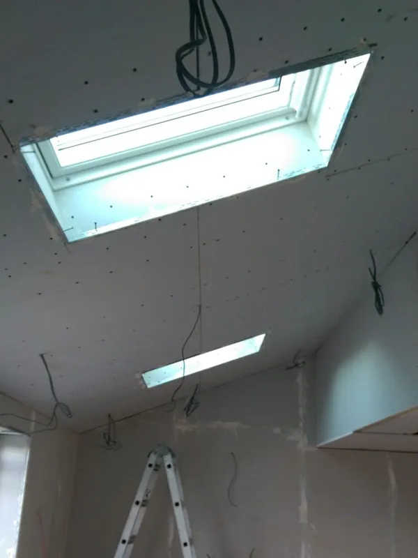 Vaulted extension ceiling with skylights at first-fix stage